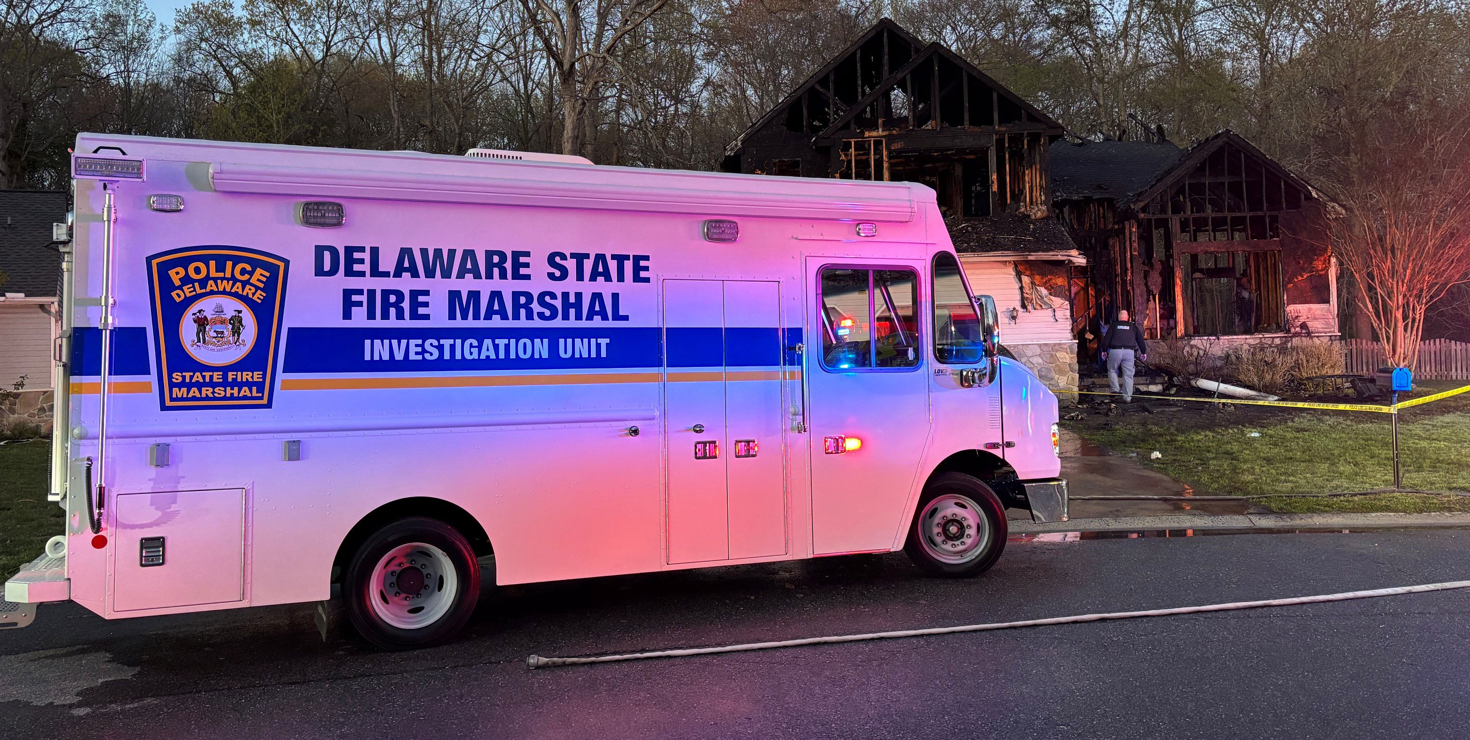 Fire Marshal van at the scene of a fire.